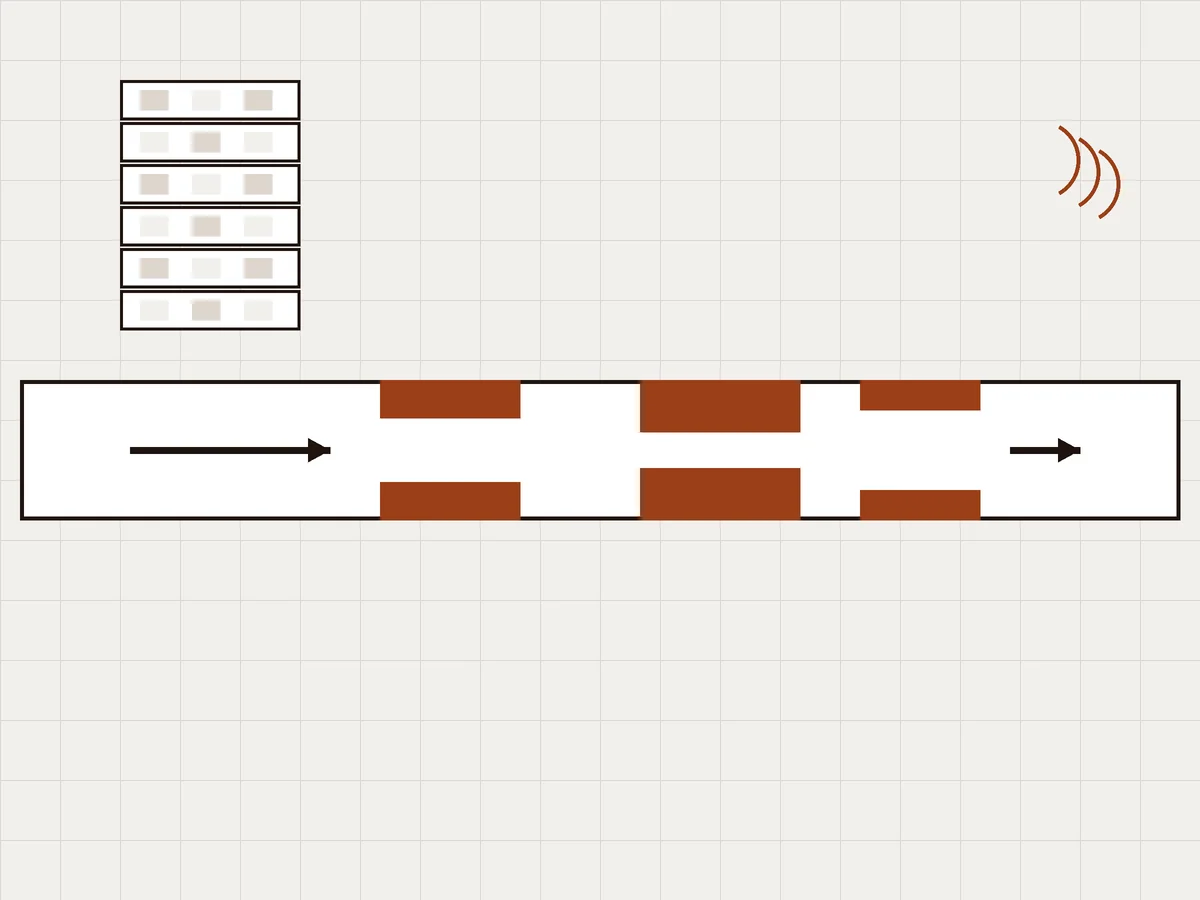 Drawn diagram of a pipe narrowed by scale deposits, with a block of flats above